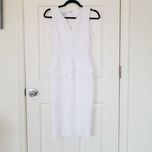 Pure white bebe peplum midi dress